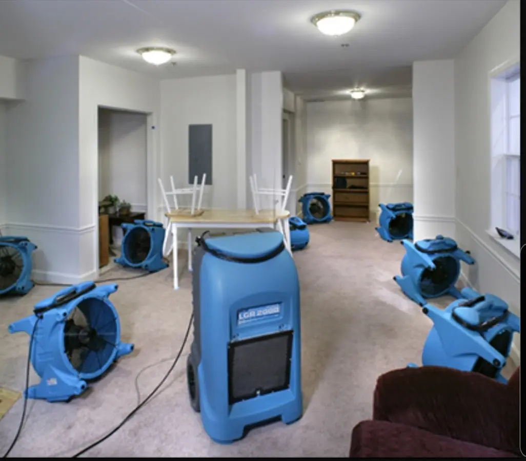 Air movers and dehumidifier setup for Water Damage Restoration in Dickson